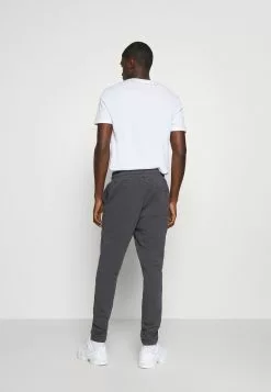 YOURTURN Prix Bradés Loose Fit UNISEX - Pantalon de survêtement trouser Normale all -Vêtements Boutique 03e64fcce775408a9e7aa2a9ae2a98c6