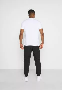 YOURTURN Bon Rapport Coût-Efficacité UNISEX - Pantalon de survêtement trouser Normale all -Vêtements Boutique 84d2f3ac913541f9b4e3212b19786e01